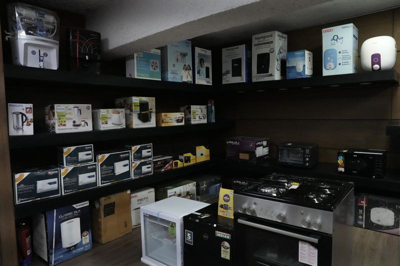 Home appliances stocked on shelves