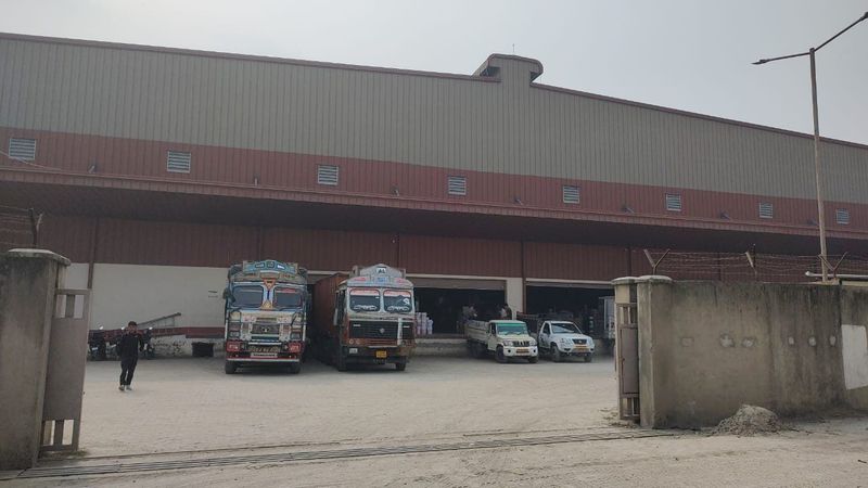 Warehouse loading area with trucks